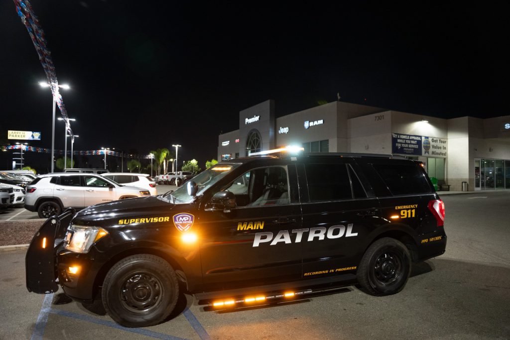 Main Patrol marked patrol SUV with amber lights at night